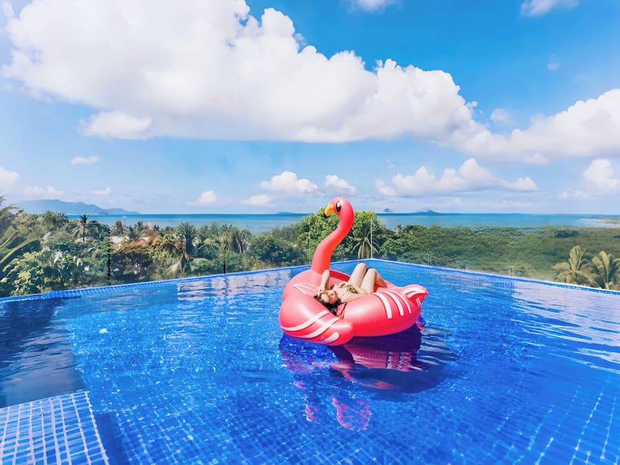 Outdoor pool, open 6 AM to 10 PM, pool loungers