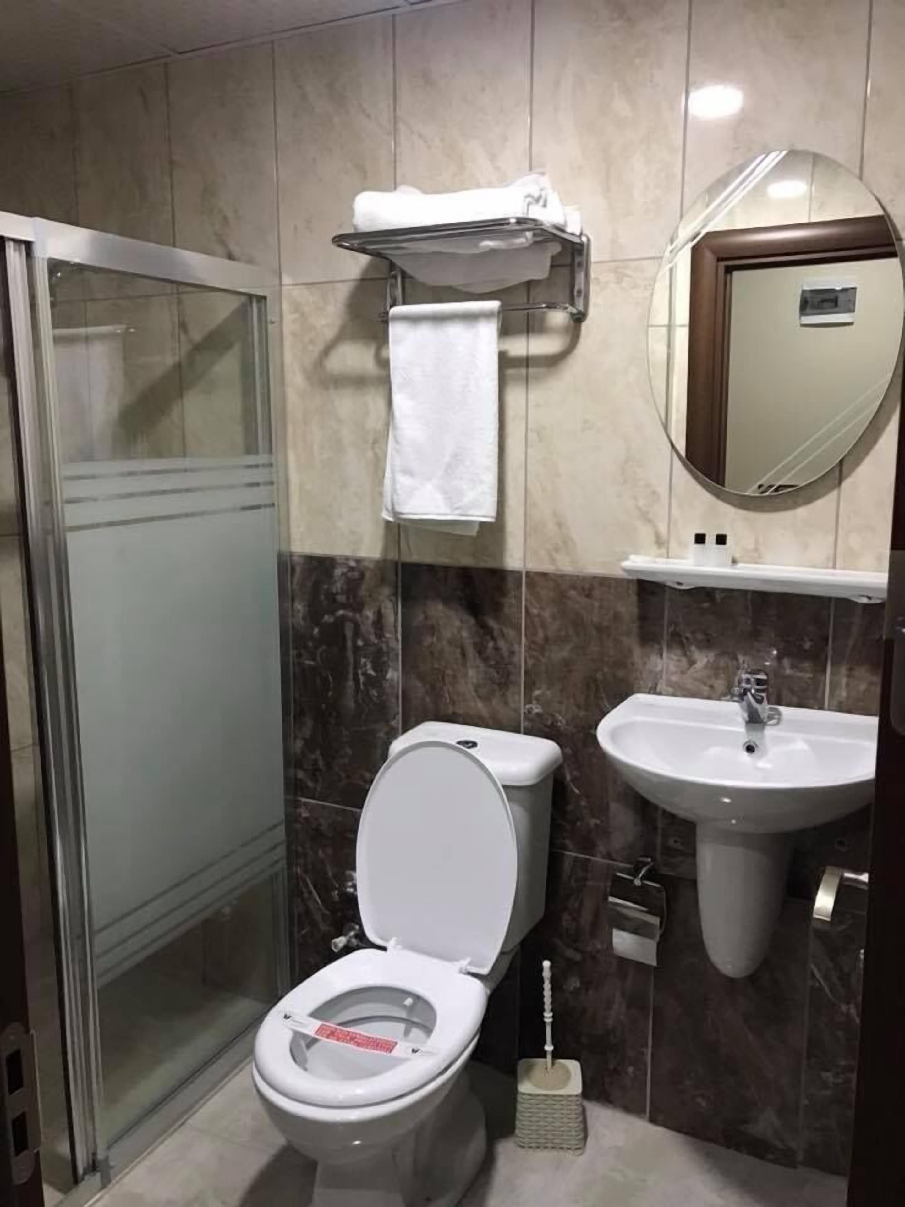 Shower, free toiletries, hair dryer, slippers