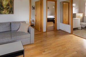 Classic Apartment, 2 Bedrooms, Mountain View | Living area | 32-inch flat-screen TV with cable channels, TV