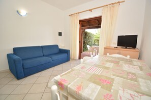 Apartment, 1 Bedroom | Living area | Flat-screen TV - Airone Apartment (San Teodoro)