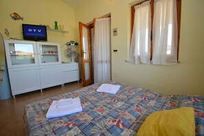 Standard Apartment, 1 Bedroom | Living area | TV - Casa Nadia (San Teodoro)