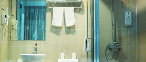 Shower, free toiletries, hair dryer, slippers