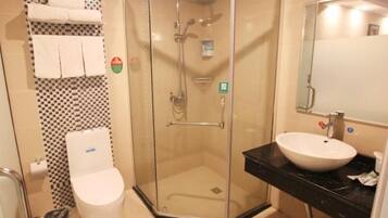 Shower, free toiletries, slippers, towels