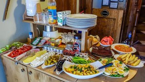 A buffet with various food items and condiments. - Kum Pansiyon  (Amasra)