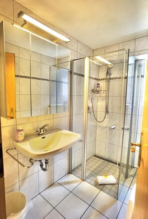 Shower, free toiletries, hair dryer, towels