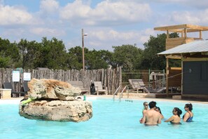 Seasonal outdoor pool, open 11:00 AM to 8:30 PM, sun loungers