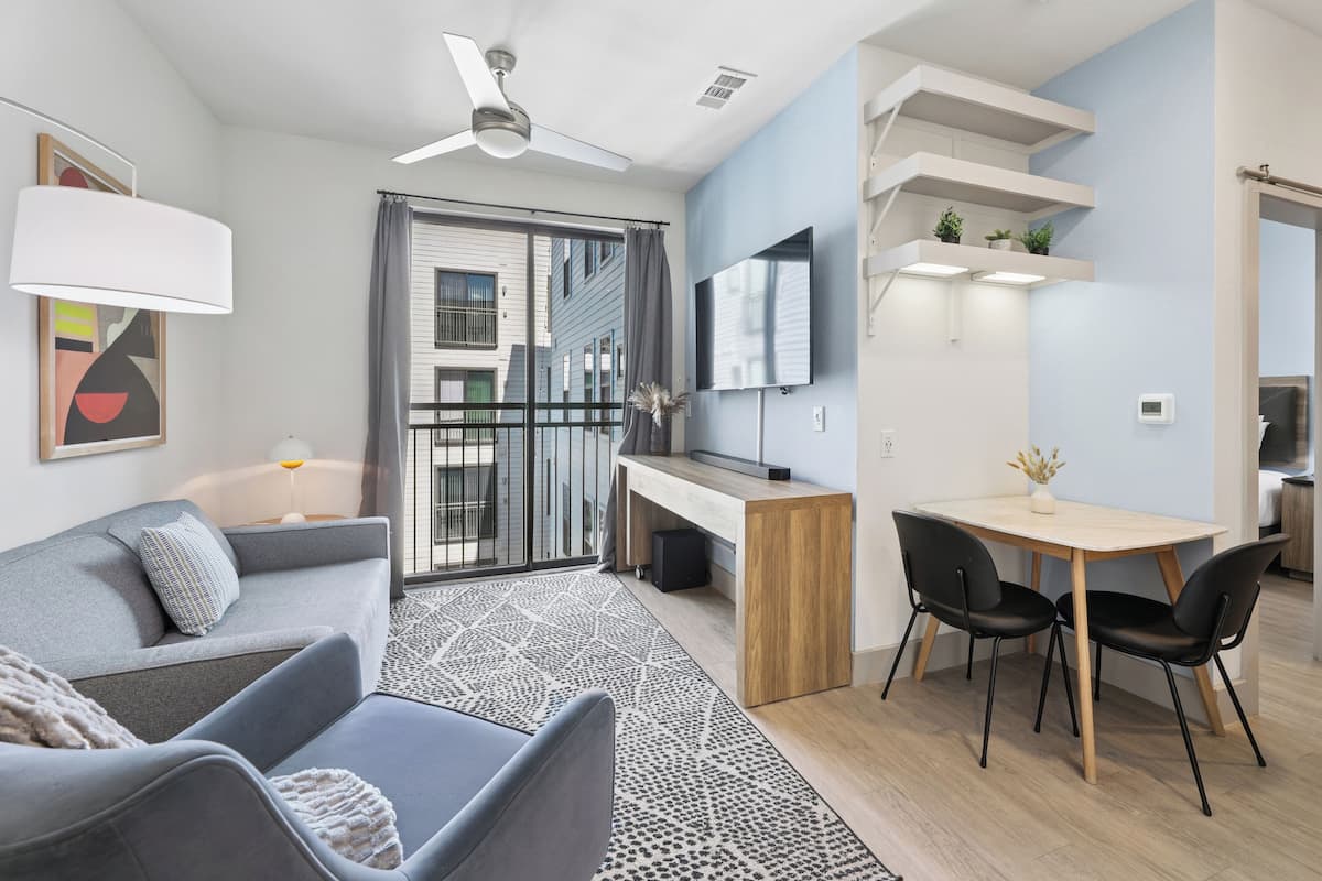 Apartment, 2 Bedrooms, Non Smoking, Kitchen | Living area | 55-inch flat-screen TV with digital channels, TV