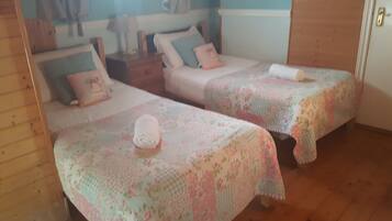 Family Quadruple Room, Multiple Beds, Garden View | Premium bedding, iron/ironing board, free WiFi