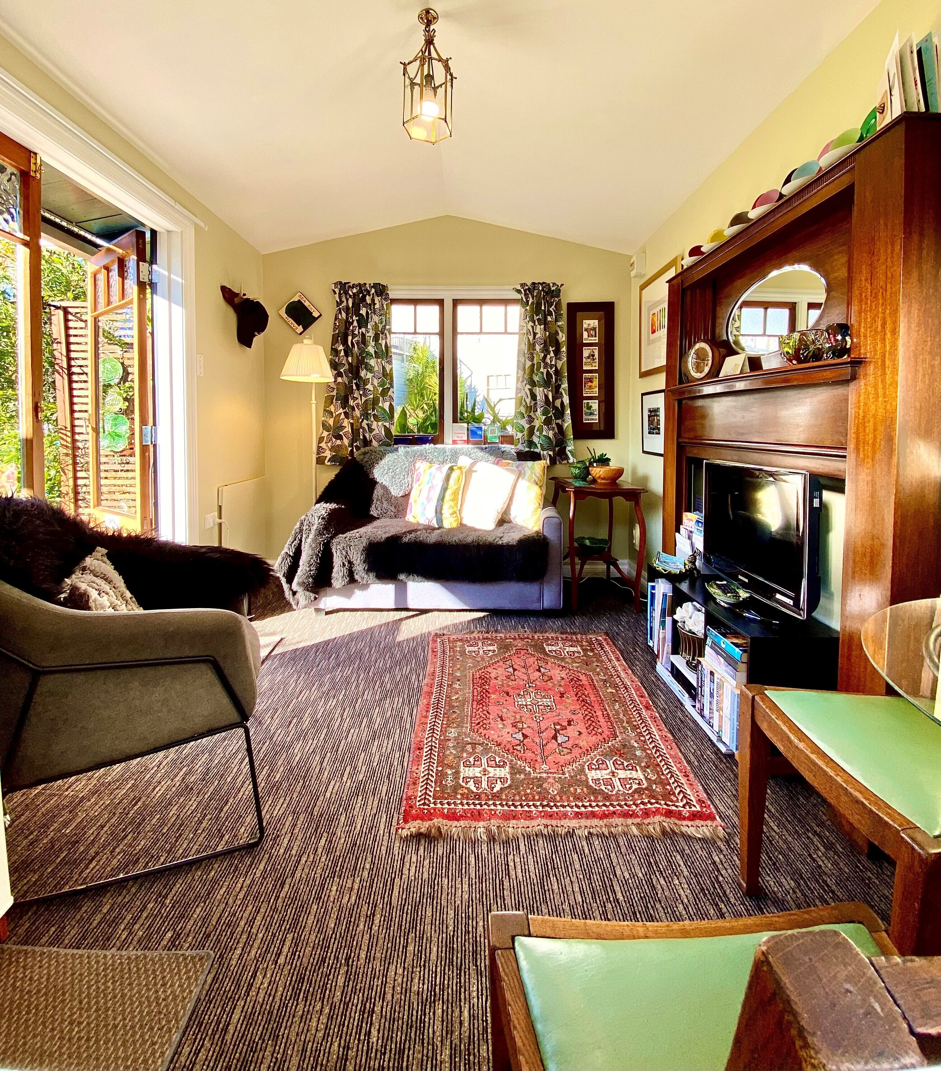 Signature Chalet, 1 Queen Bed, Non Smoking, Garden View | Living area | Flat-screen TV, iPod dock