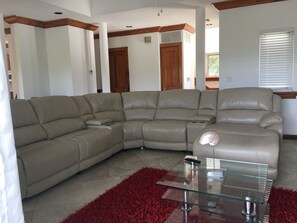 65-inch Smart TV with cable channels, TV, Netflix - Blue Orchid Villa (Moss Town)