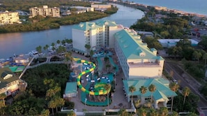 A resort with a water park, a river, and a beach.