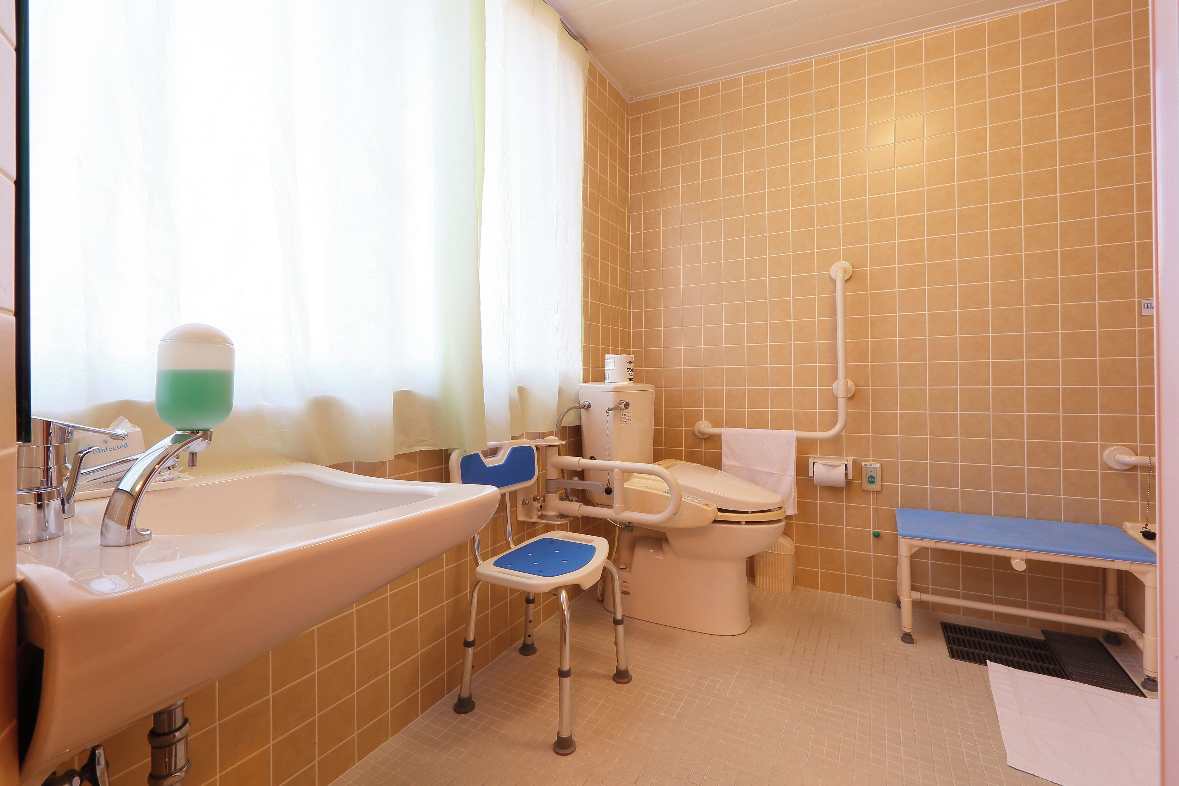 universal twin room, non smoking (barrier free) | bathroom | hair dryer, slippers, electronic bidet, toilet paper