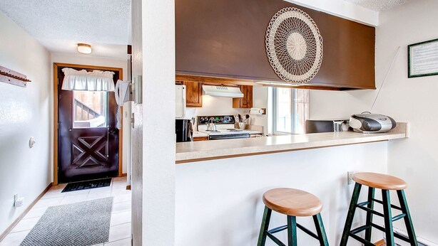 Condo, 2 Bedrooms | Living area | Flat-screen TV, fireplace - Mark IX 6 by Peak Property (Breckenridge)