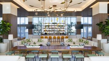 2 bars/lounges, rooftop bar, lobby lounge