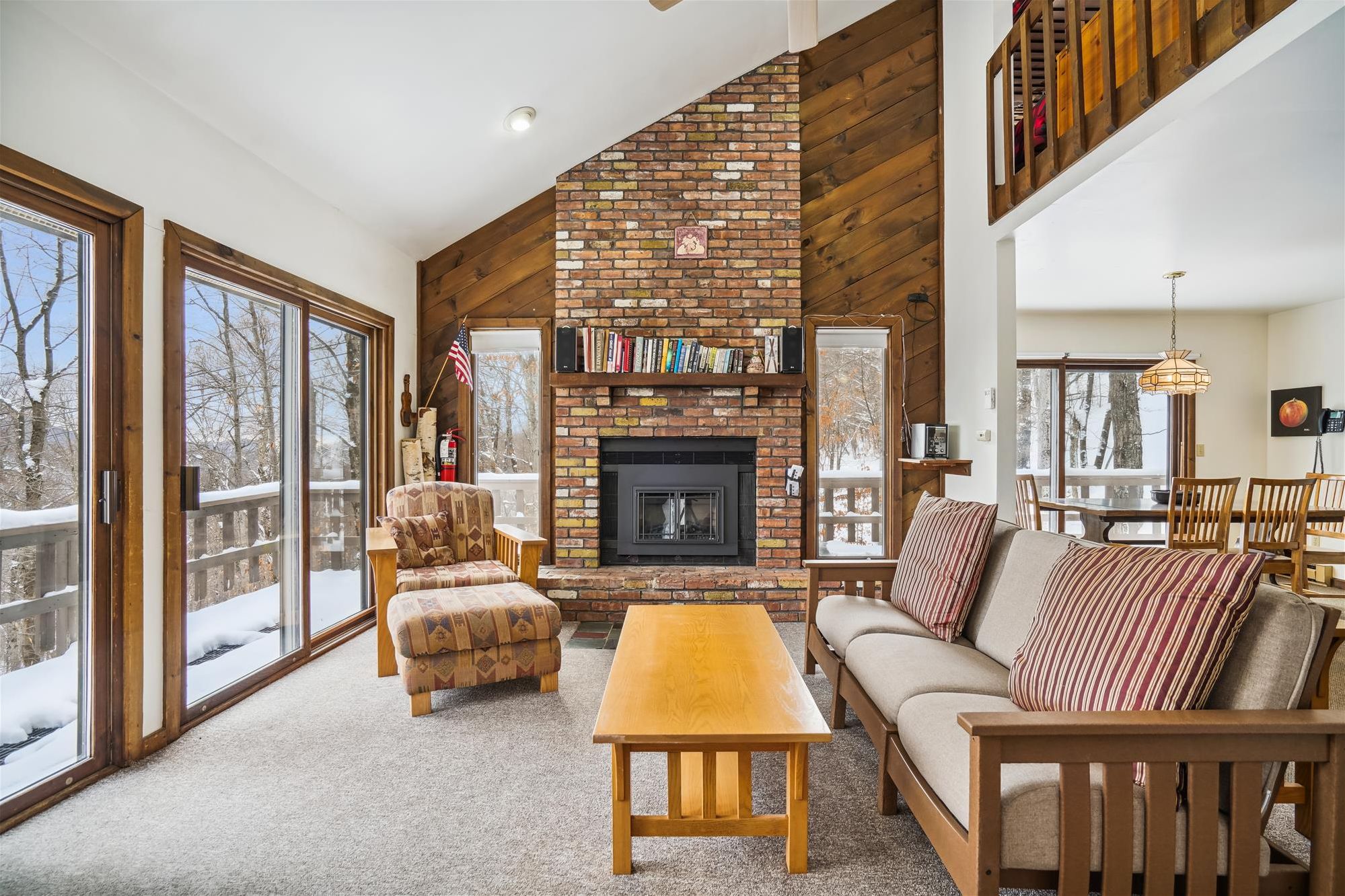 Living Room with Mountain Views - Natural light and scenic views bring the beauty of Vermont indoors, creating the perfect setting for a relaxing getaway.