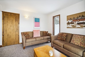 Cozy Sitting Room - A welcoming spot to unwind, read a book, or enjoy conversation after a day of outdoor adventure.