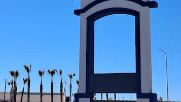 Welcome to Days Inn, where you can enjoy a resort-like atmosphere surrounded by palm trees.