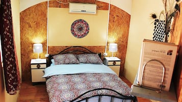 Doppia Design | Copriletto in piuma, materassi in memory foam, minibar, insonorizzazione