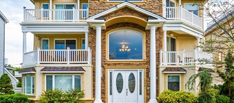 Seaside Beach Mansion w/9 Bedrooms, 8 Full Baths, Pool, Elevator & Rooftop Deck.