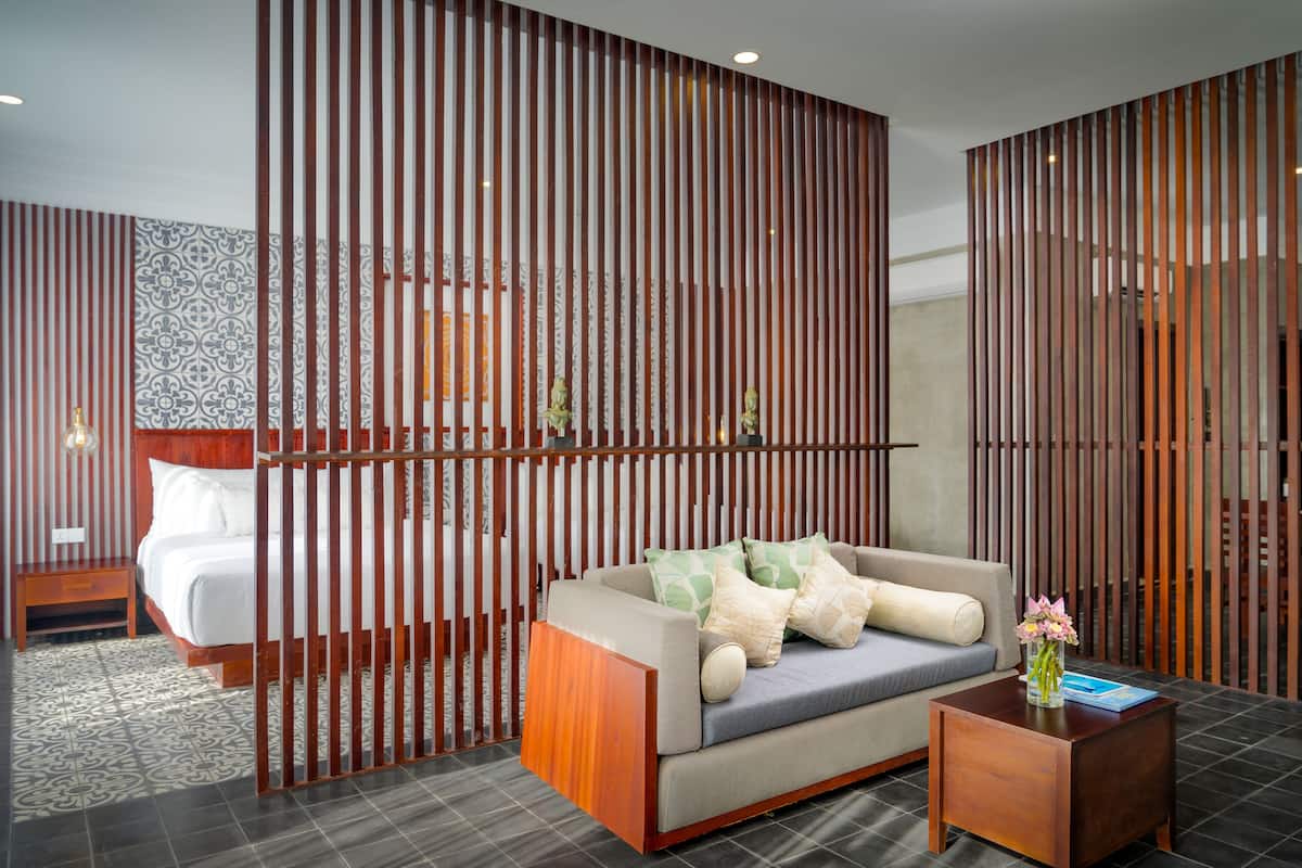 family room | 1 bedroom, pillow-top beds, free minibar items, in-room safe