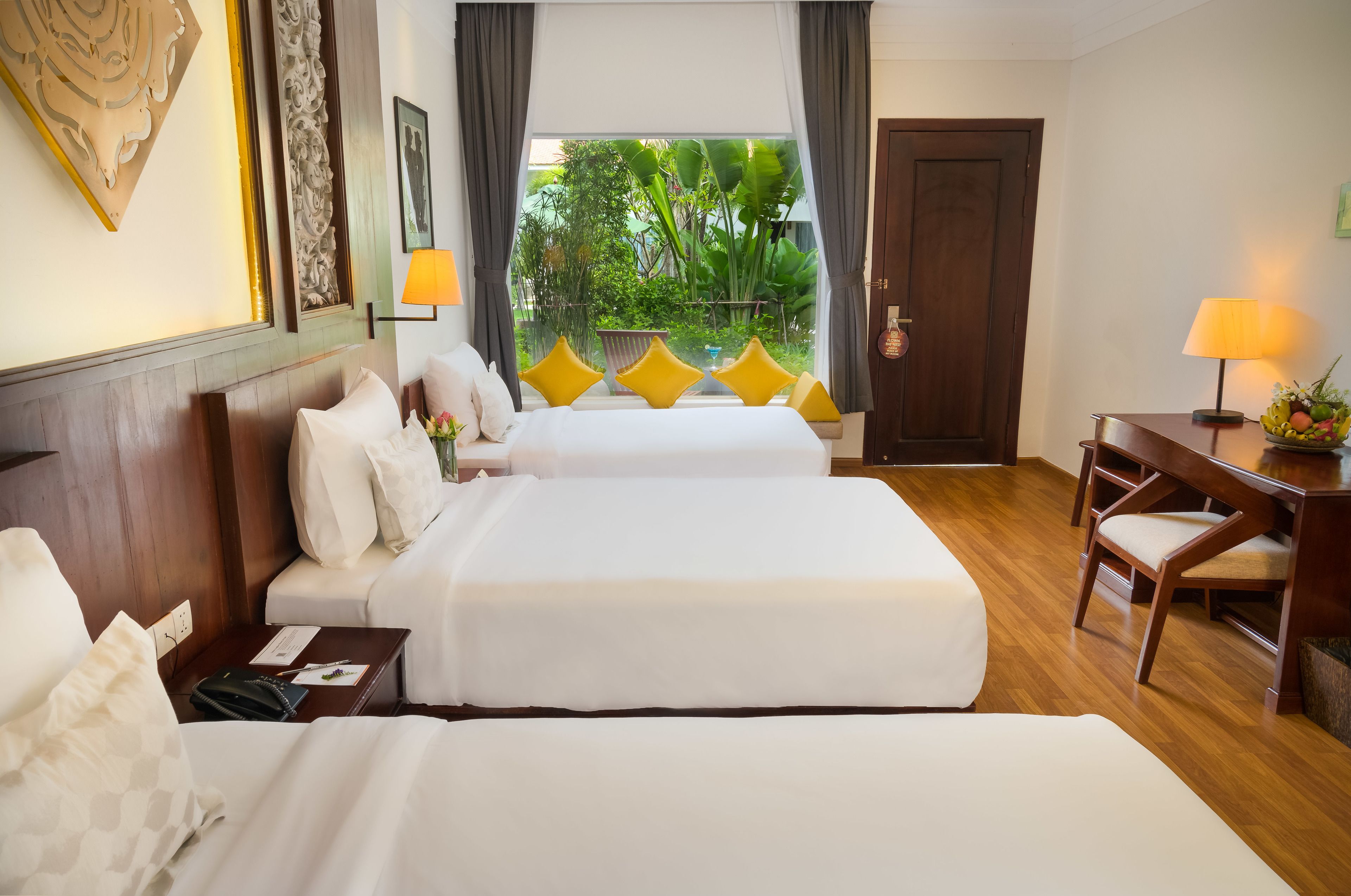 deluxe triple room, pool view | 1 bedroom, pillow-top beds, free minibar items, in-room safe