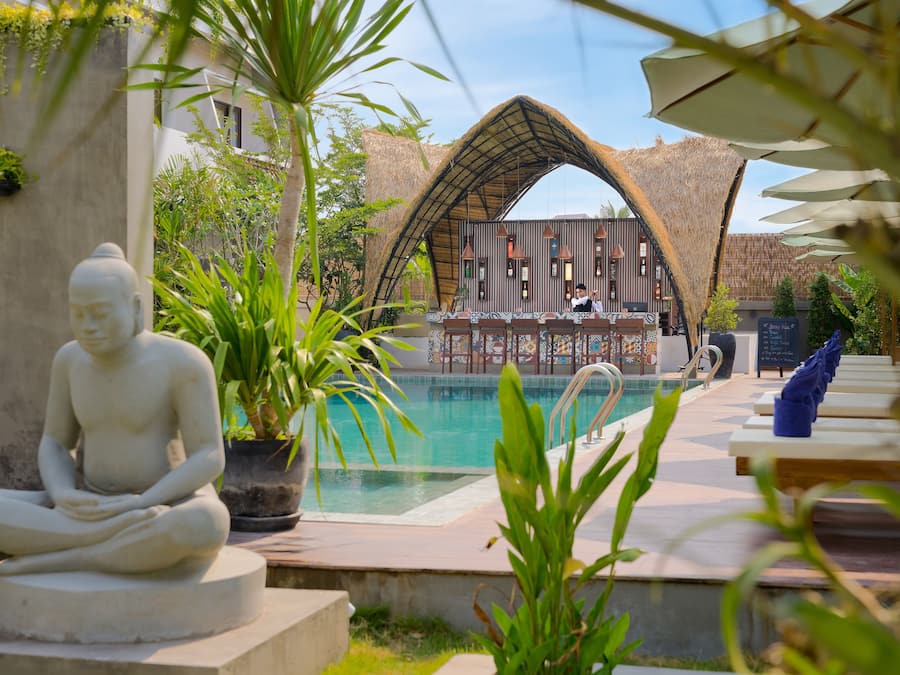 Outdoor pool, pool umbrellas, sun loungers