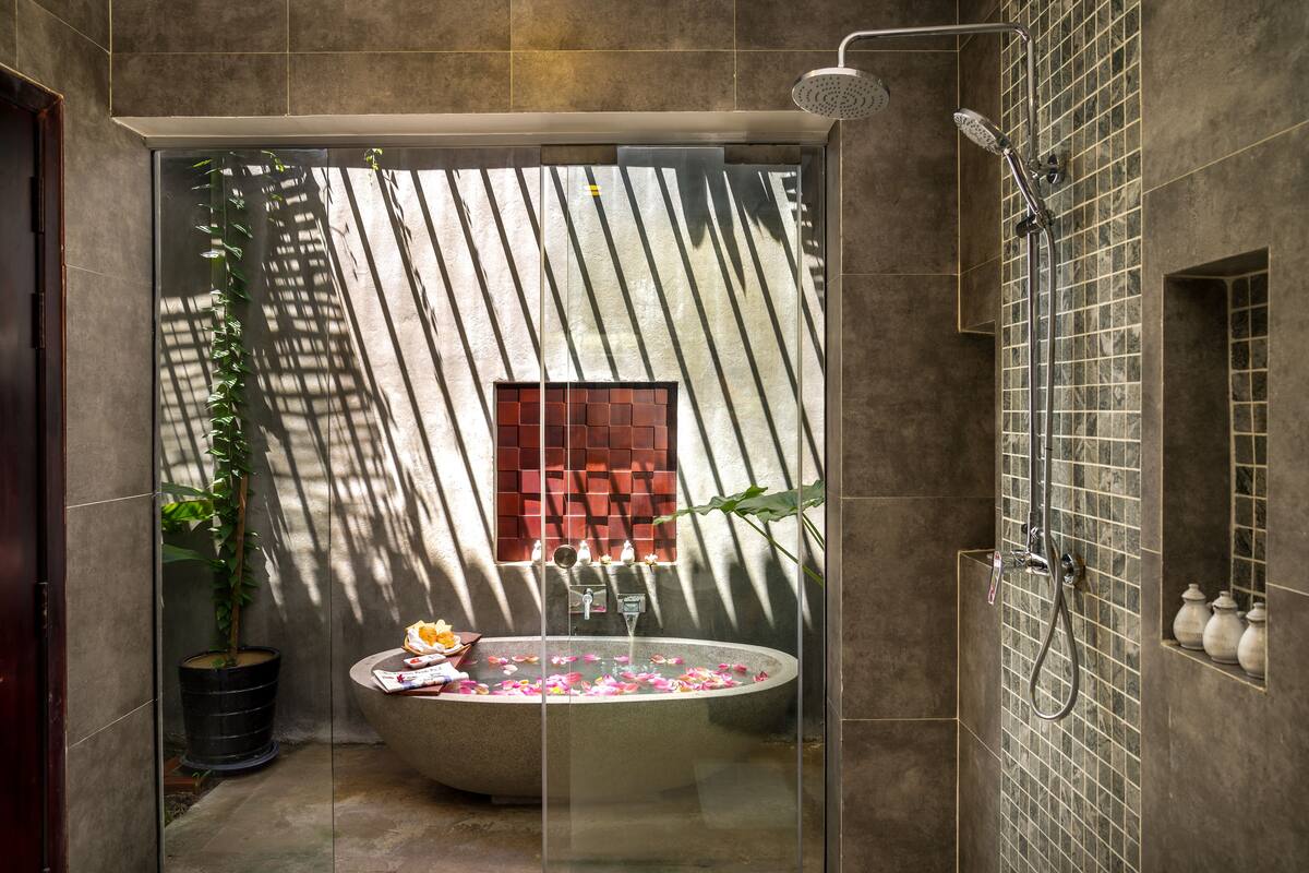 grand suite | bathroom | shower, rainfall showerhead, designer toiletries, hair dryer