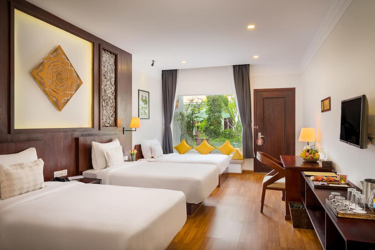 Deluxe Triple Room, Pool View | 1 bedroom, pillow-top beds, free minibar items, in-room safe