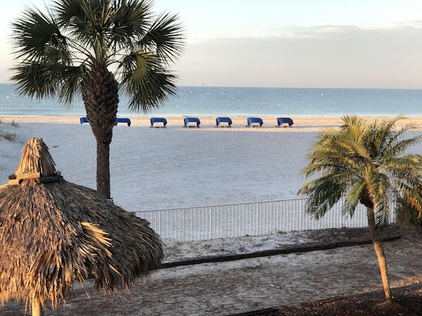 On the beach, sun loungers, beach umbrellas, beach towels