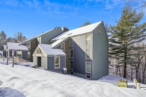 Scenic Condominium Exterior - The inviting exterior blends mountain charm with easy access to everything the resort area has to offer.