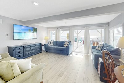 Huge Beach House w/Large Beachfront Patio! Beach Vacation for the Entire Family. Fire Pit. Free Fun.