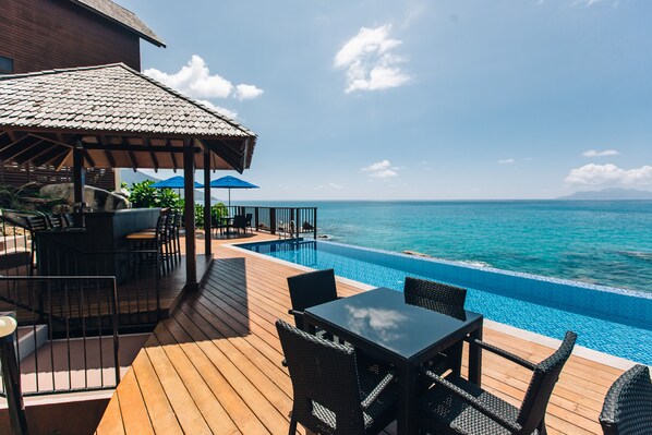 Relax on the deck, surrounded by ocean views and a tranquil atmosphere.
