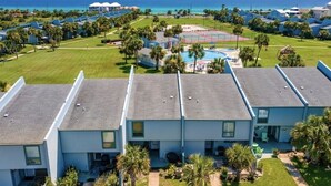 A resort with multiple buildings, a swimming pool, and a tennis court. - Unit 37, Sea Haven, 2 Bedroom Beach Condo (Panama City Beach)