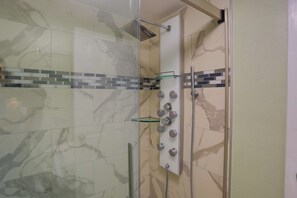 Shower, rainfall showerhead, hair dryer, towels - Beachfront Studio Condo. Heated Pool.  Perfect Views From Private Balcony. (Treasure Island)