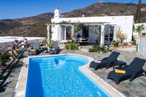 Seasonal outdoor pool, pool umbrellas, pool loungers