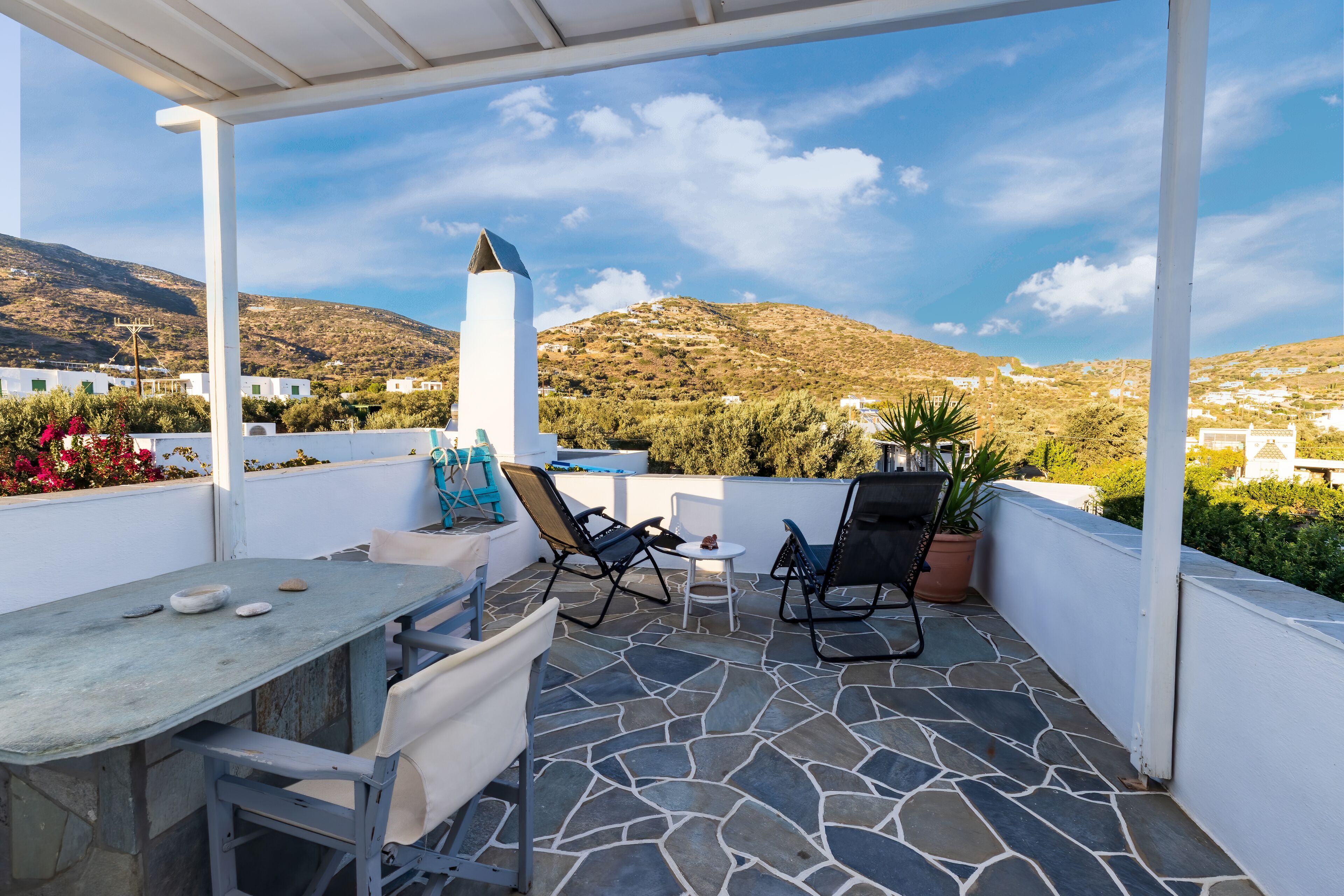 Studio – deluxe | Oppholdsområde | En 32-tommers Flatskjerm-TV med kabel-kanaler samt TV