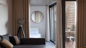 Family Duplex, 1 Bedroom, Balcony | Living area | 50-inch flat-screen TV with cable channels, TV