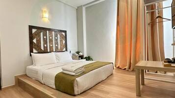 Deluxe Double Room, Balcony | Desk, iron/ironing board, free WiFi, bed sheets