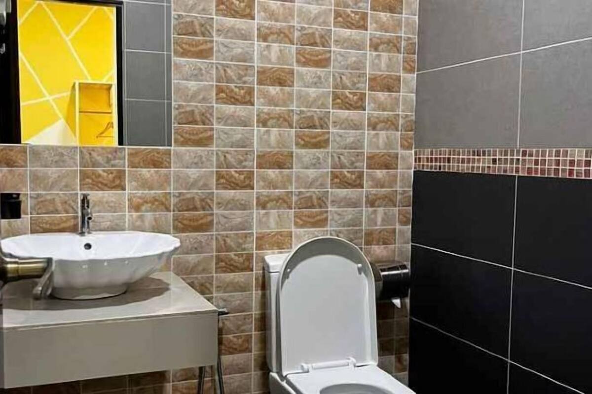 Bathroom | Shower, free toiletries, hair dryer, slippers