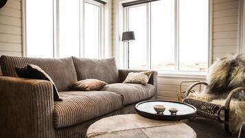 Luxury Cabin, 2 Bedrooms | Living room | TV, DVD player