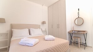 Vila, 2 quartos | 2 quartos, frigobar, cofres nos quartos, Wi-Fi de cortesia