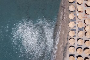 Private beach, white sand, free beach cabanas, sun loungers