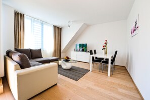 Luxe appartement | Woonruimte | Een flatscreentelevisie