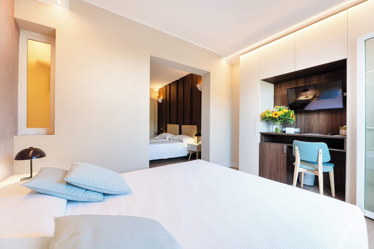 family quadruple room | 1 bedroom, minibar, in-room safe, desk