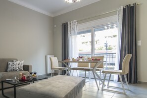 Apartment, Balcony | Living area | 32-inch LCD TV with satellite channels, TV, DVD player - Down Town Modern Apartments (Athens)
