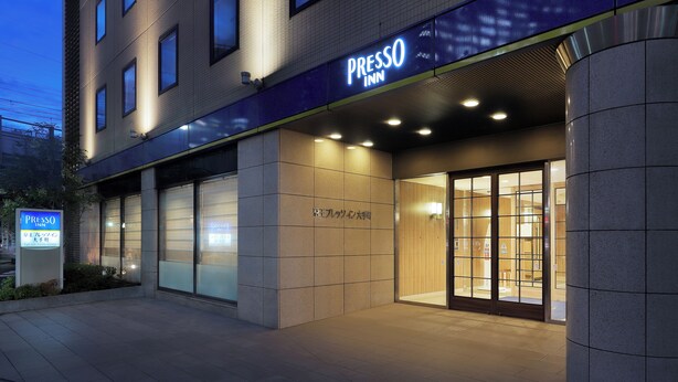 A modern hotel entrance with a prominent signage for 'Presso Inn'. - Keio Presso Inn Otemachi (Tokyo)
