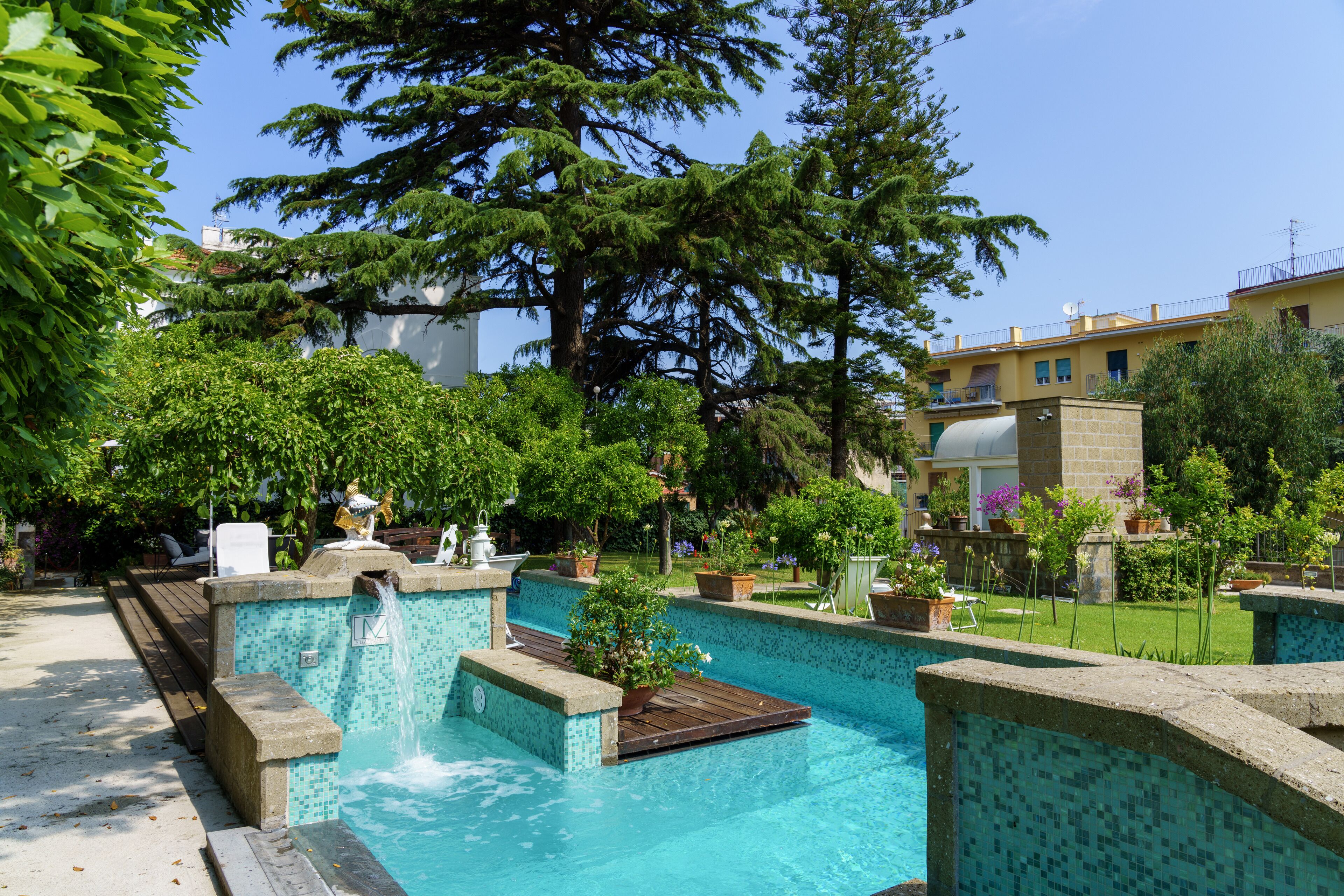 Seasonal outdoor pool, pool umbrellas, sun loungers