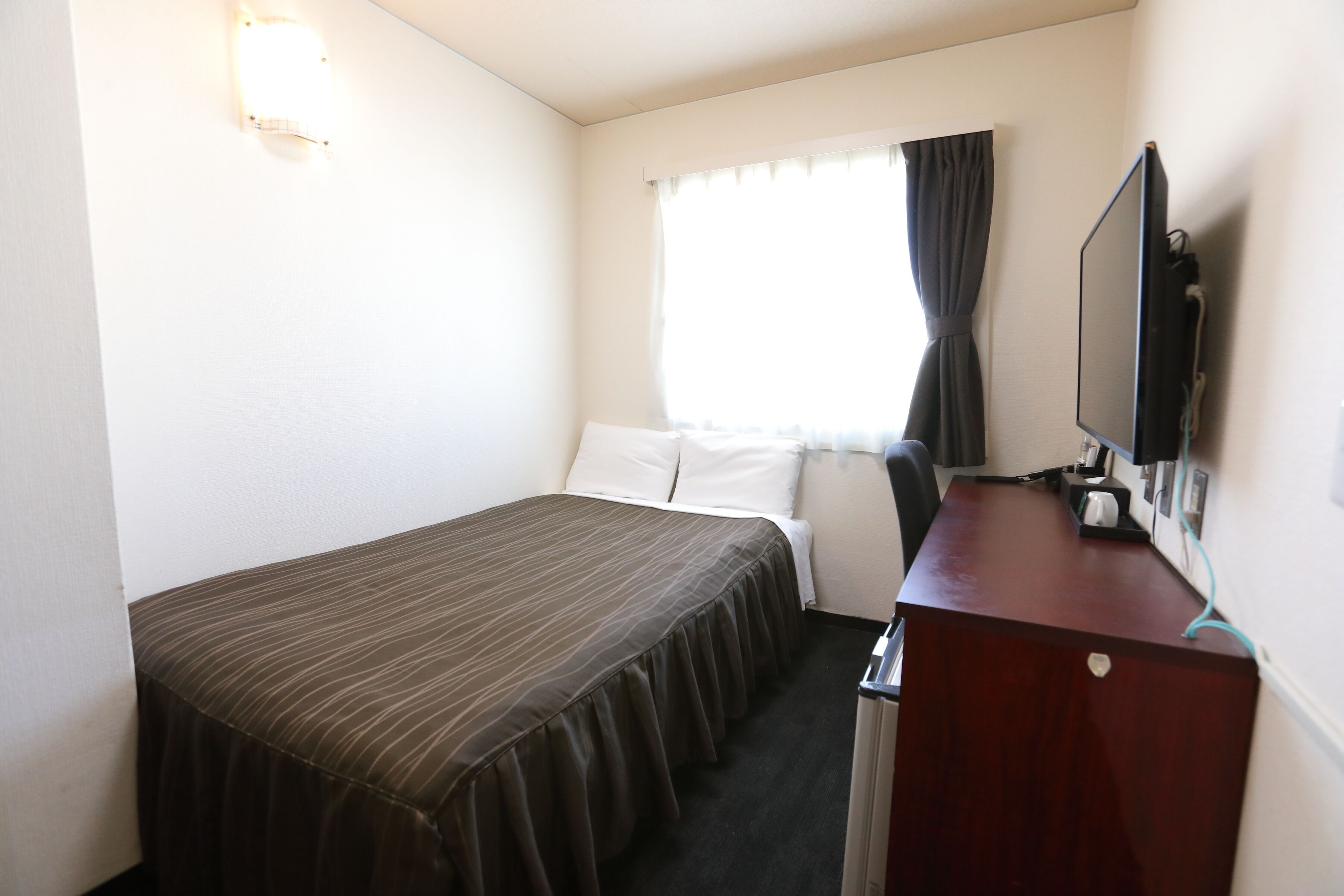 desk, blackout curtains, iron/ironing board, free wifi