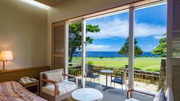 Twin Room, Ocean View, Patio, Ground Floor | In-room safe, desk, free cribs/infant beds, free WiFi