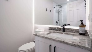 Shower, hair dryer, shampoo